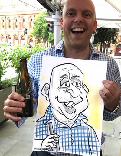 man holding a beer