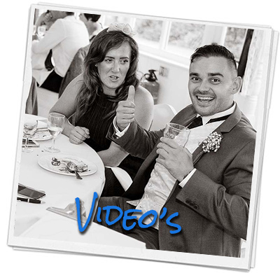 Wedding guest gives a thumbs up while seeing his caricature