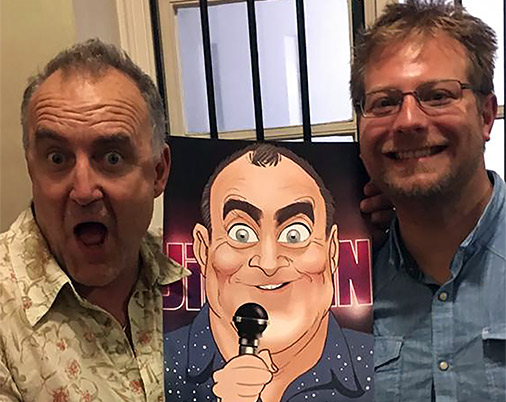 Jimeoin and caricaturist have a joke about the caricature together