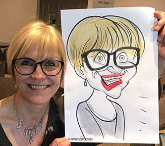 female is captured holding her waggish caricature