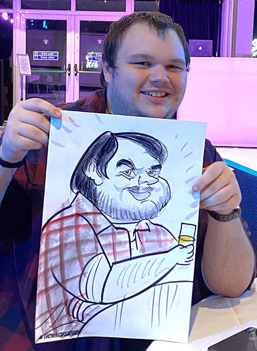 man at a Christmas work party with caricature man at a Christmas party with cariacture
