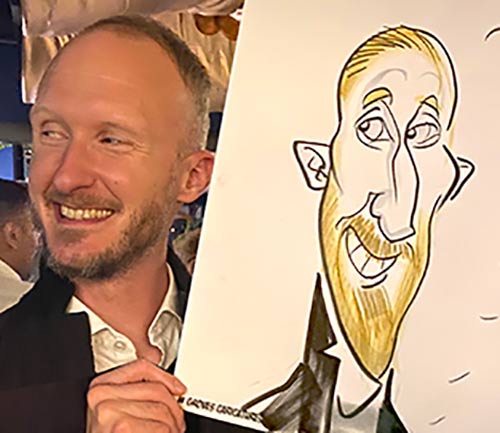 man looking away from his caricature guy looking away from his caricature