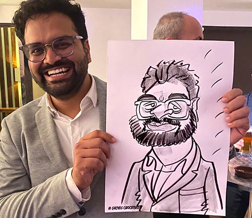 Cartoons at Heathrow staff party Caricatures at Heathrow staff party